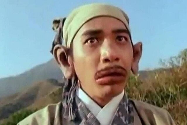 梁朝偉香腸嘴造型